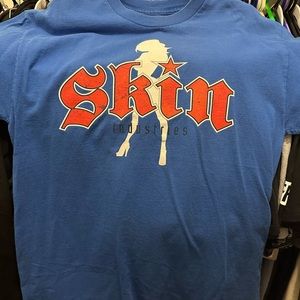 Large blue Skin Industries shirt